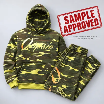 A finished hoodie sample matching the approved design sketch.